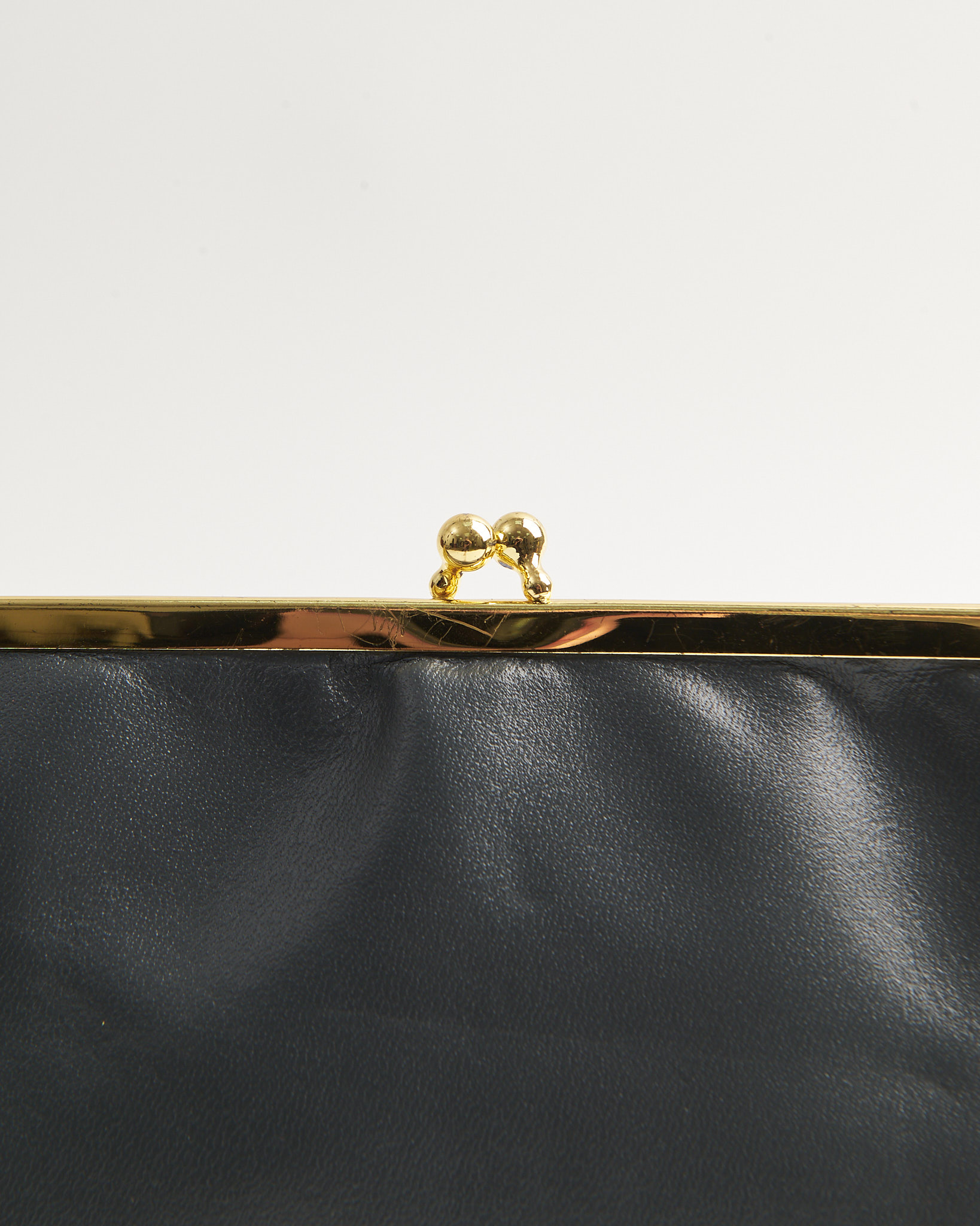 Миниатюрная сумка-клатч из кожи — изображение 2